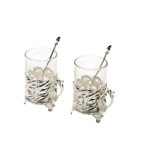 a set of two silver plated mugs with peacock handles and spoons