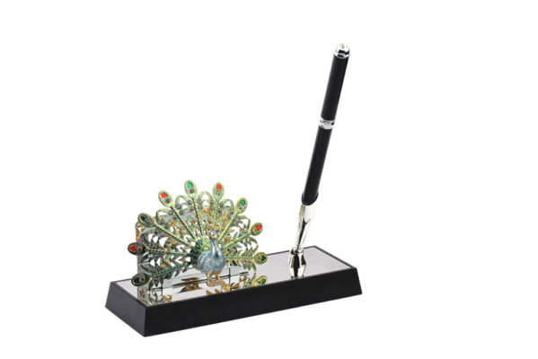 a beautiful silver plated pen stand along with the structure of multicolored peacock on its base