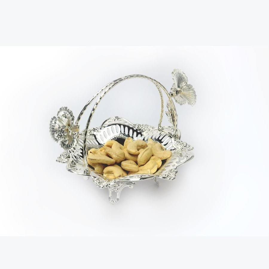 a luxurious silver basket decorated with flowers and a sleek handle to hold premium dry fruits and much more