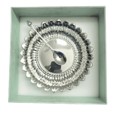 a Sunflower shaped silver plated bowl with a spoon