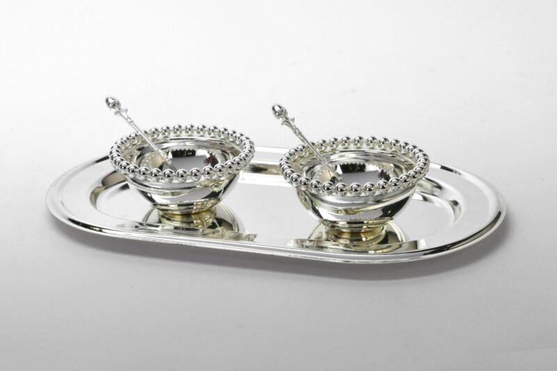 a set of two Balls beaded bowls set with tray