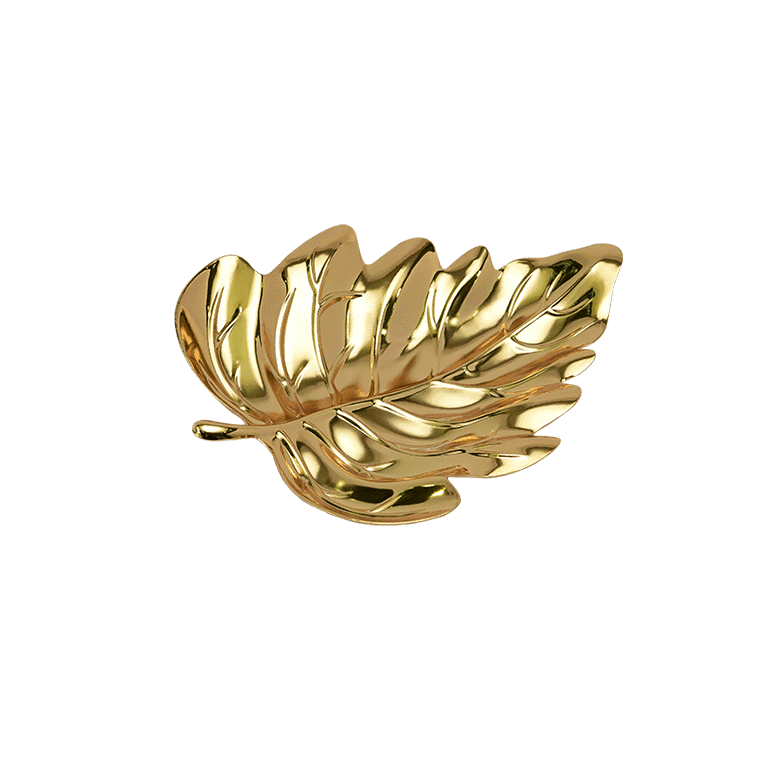a leaf shaped golden platter