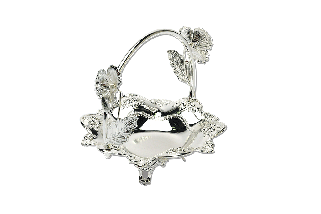 a silver plated flower basket with detailed elements