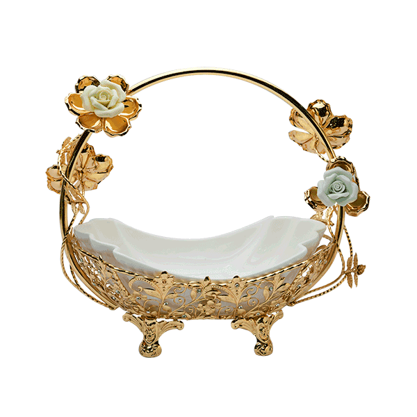 A Golden Basket With A White Ceramic Bowl, Four Designer Legs & Pastel Colour Flowers On Its Sleek Handle