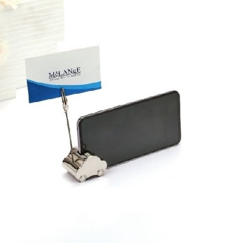 Car design mobile holder holding mobile phone in black and card clipper holding a sample business card.