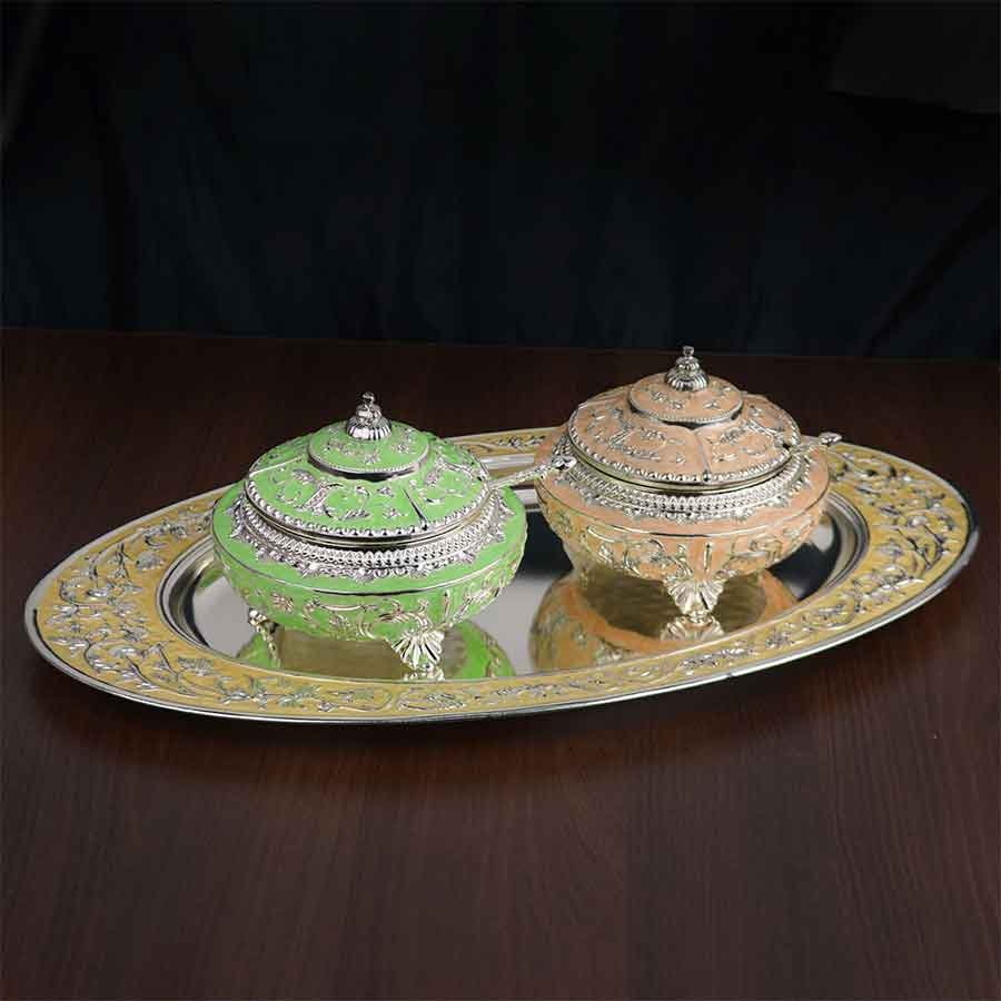 Silver-plated, enameled sugar pots with oval tray and spoons, in pastel green and orange color.