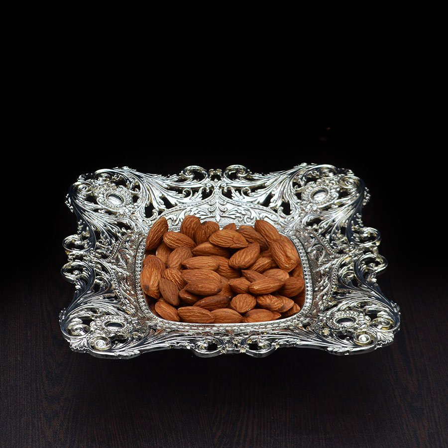 Cutwork border silver serving tray served with almonds