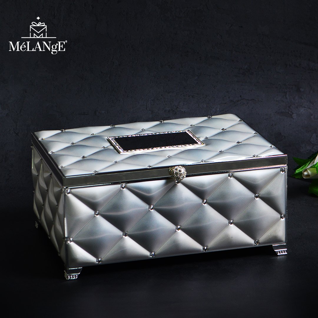 Tufted Design Silver Box with dark background